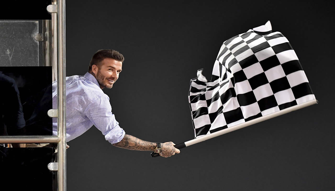 David Beckham flamea la bandera a cuadros del GP de Bahrein